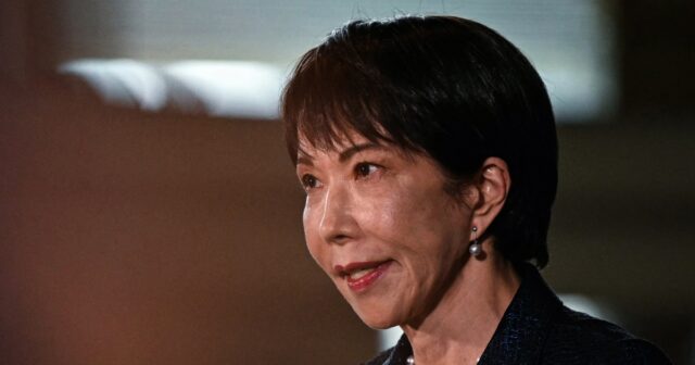 Japan approves scrapping a ban on deadly weapons exports in a exchange of its postwar pacifist protection