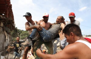 Venezuela digs by quake rubble… Venezuela digs by quake rubble…