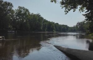 Two adults and a child who disappeared while tubing on a Michigan river found genuine Two adults and a child who disappeared while tubing on a Michigan river found genuine